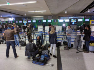 Reporters gather in front of the EgyptAir counter at Charles de Gaulle Airport outside of Paris on Thursday, May 19, 2016. An EgyptAir flight from Paris to Cairo carrying 66 people disappeared from radar early Thursday morning, the airline said. (AP Photo/Raphael Satter)