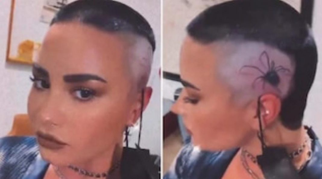 demi lovato se rapa y tatua